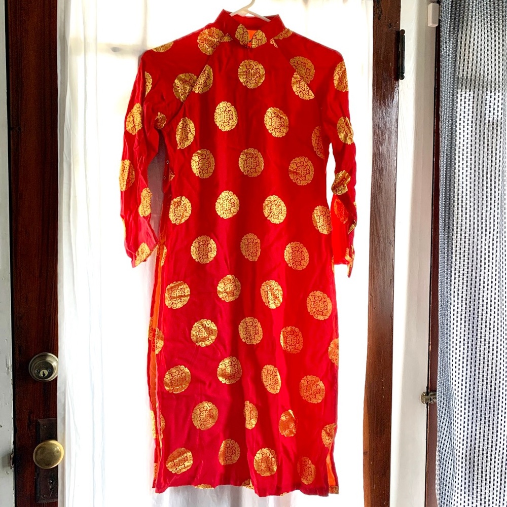 Child M/L red and yellow embroidered Ai do